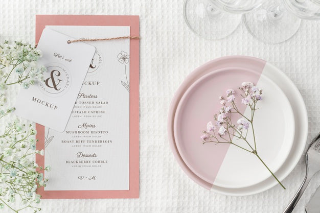 Top View Of Table Arrangement With Spring Menu Mock-Up And Plates Psd
