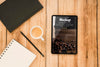 Top View Of Tablet With Coffee Cup And Notebook Psd