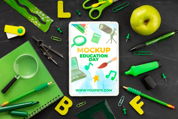 Top View Of Tablet With School Essentials And Apple For Education Day Psd