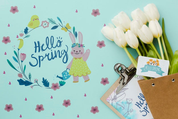 Top View Of Tulips And Notepad Psd