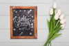 Top View Of Tulips Bouquet With Blackboard Psd