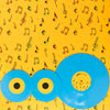 Top View Of Vinyls On Yellow Background Psd