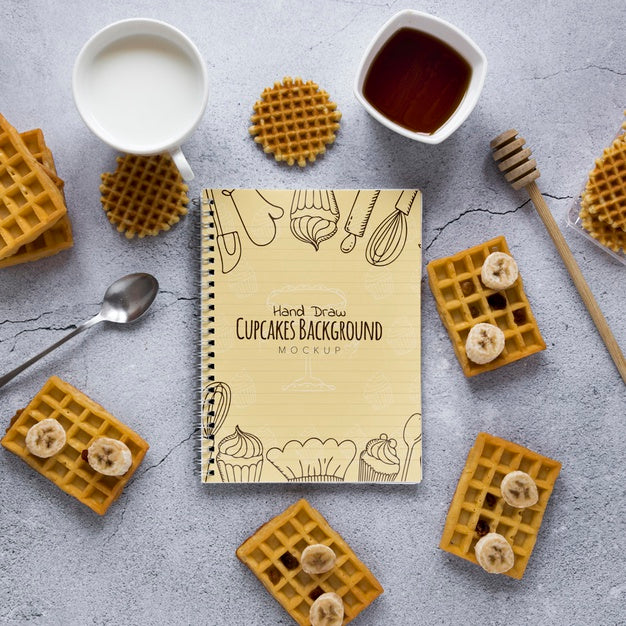 Top View Of Waffles With Banana Slices And Honey Psd