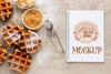 Top View Of Waffles With Notebook Psd