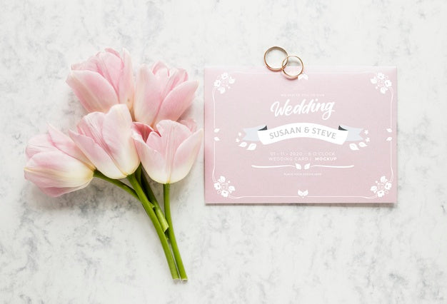 Top View Of Wedding Card With Bouquet Of Tulips And Rings Psd
