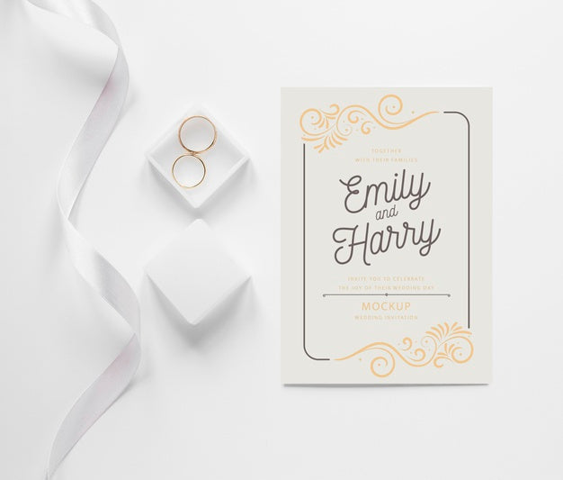 Top View Of Wedding Card With Ribbon And Rings Psd
