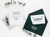 Top View Of Wedding Cards With Envelope And Plants Psd