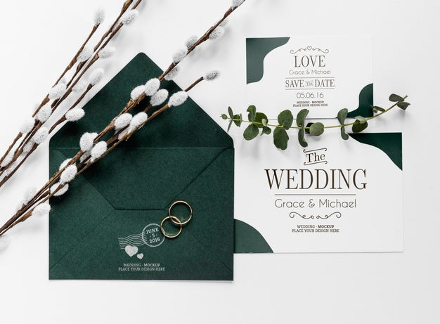 Top View Of Wedding Cards With Envelope And Rings Psd