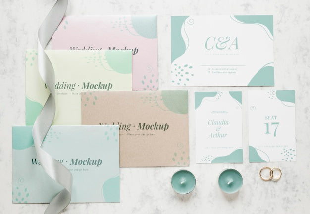 Top View Of Wedding Cards With Ribbon And Candles Psd