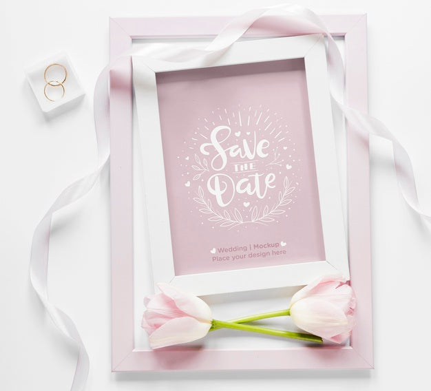 Top View Of Wedding Frame With Tulips And Ribbon Psd