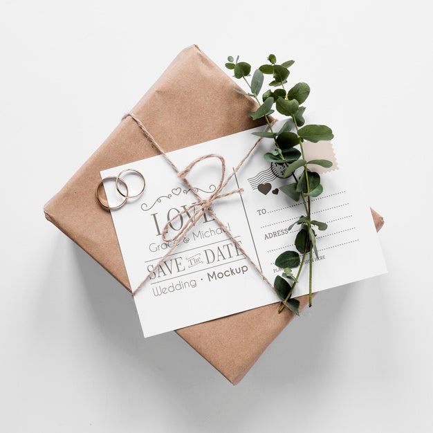 Top View Of Wedding Gift With Card And Rings Psd