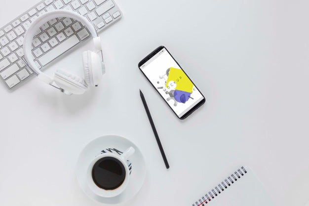 Top View Office Desk With Mobile Phone And Coffee Psd