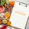 Top View On Food For Defenses With Notebook Mockup Psd
