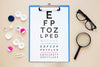 Top View Optics Still Life Composition With Clipboard Mock-Up Psd