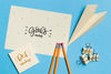 Top View Pencils With Paper Plane Psd