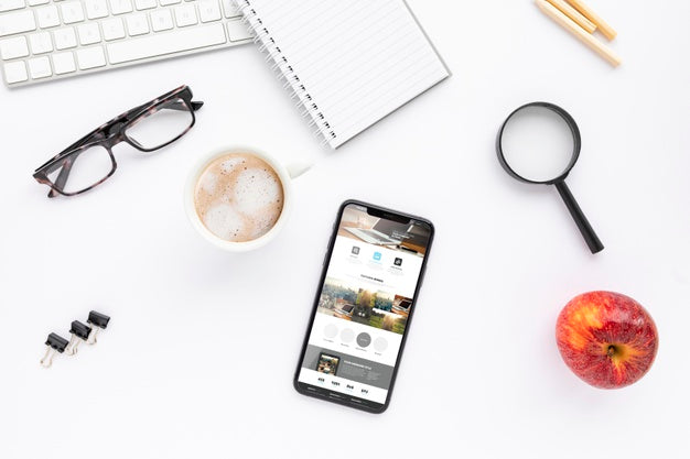 Top View Phone Mock-Up On Desk Psd