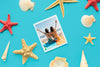 Top View Photo On Blue Background Psd