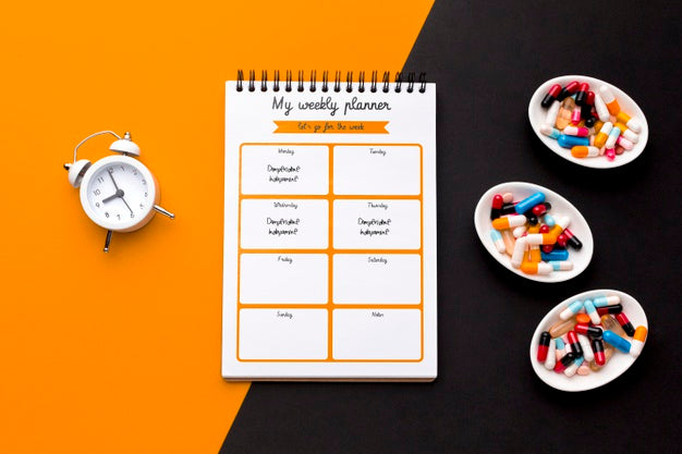 Top View Pills And Clock Arrangement Psd