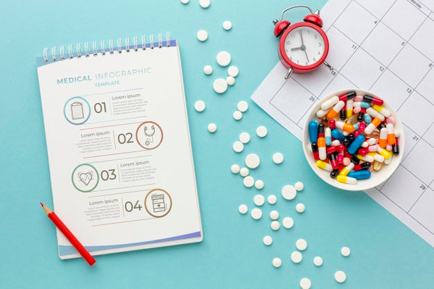 Top View Pills And Notebook Arrangement Psd
