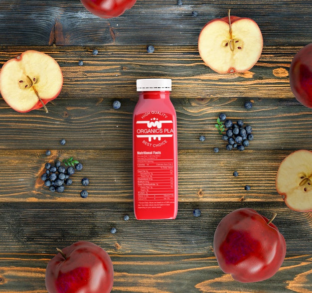 Top View Plastic Bottles On Wooden Background Psd