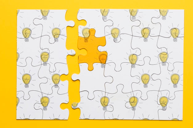 Top View Puzzle With Light Bulbs Psd