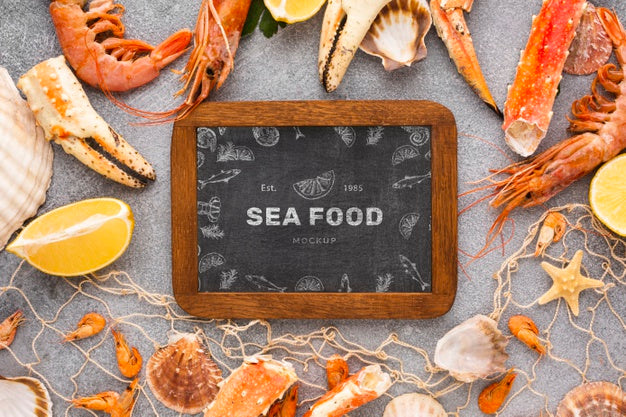 Top View Sea Food Arrangement With Blackboard Mock-Up Psd