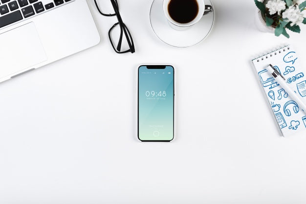 Top View Smartphone Mockup On Workspace Psd