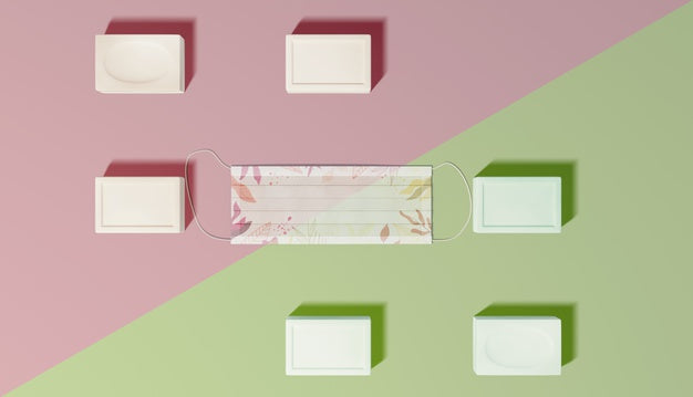 Top View Soaps And Mask Arrangement Psd