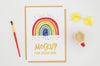Top View Stationery Mock-Up With Rainbow On Paper Psd