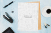 Top View Stationery Paper Mock-Up On Desk Psd