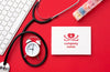 Top View Stethoscope On Red Background Psd