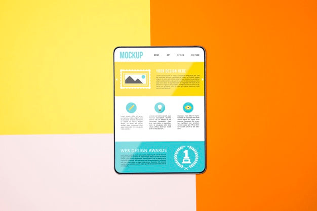 Top View Tablet On Colorful Background Psd