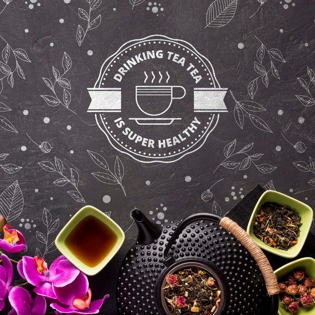 Top View Tea Pot With Herbs And Flowers Psd