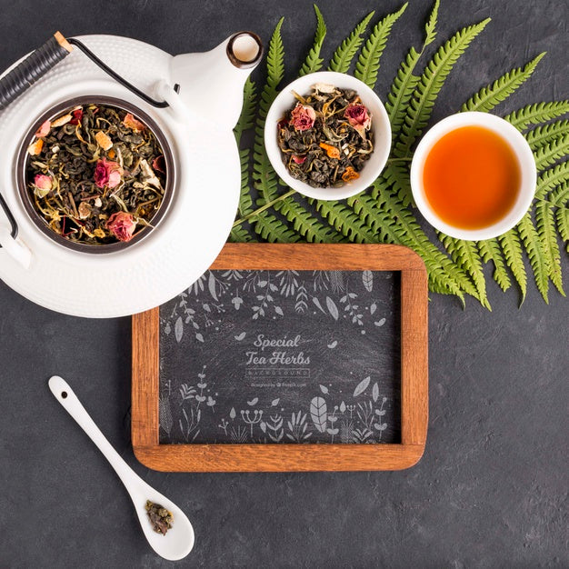 Top View Tea Pot With Menu And Herbs Psd