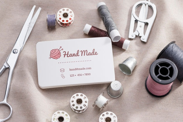 Top View Thread And Scissors Arrangement Psd