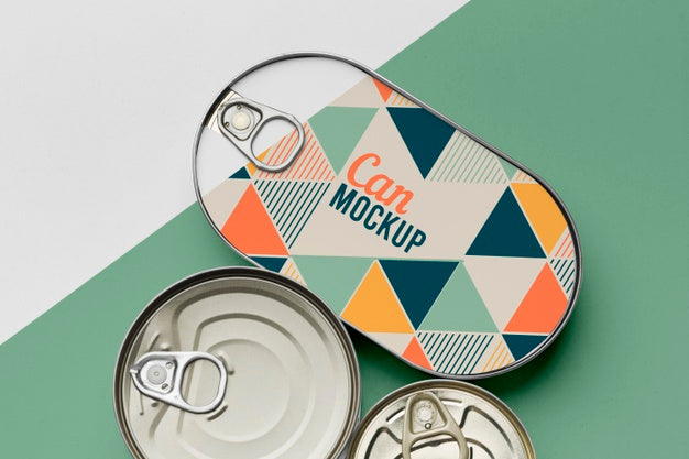 Top View Tin Cans Arranged On Table Psd