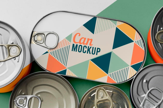 Top View Tin Cans Arranged On Table Psd