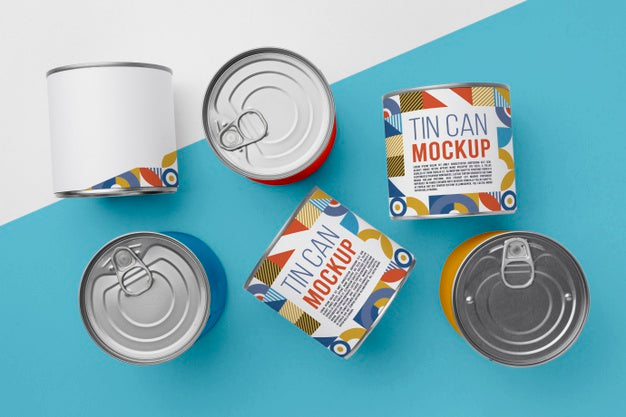 Top View Tin Cans Arranged On Table Psd