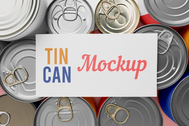 Top View Tin Cans Arranged On Table Psd