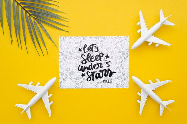Top View Travelling Plane And Card With Lettering Psd