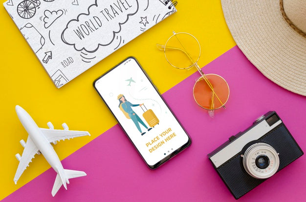 Top View Travelling Plane With Retro Camera And Phone Psd