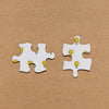 Top View Two Puzzle Pieces On Brown Background Psd