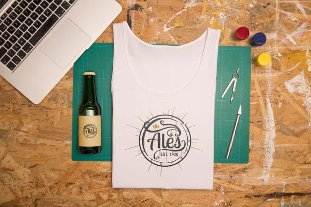 Top View White Folded T-Shirt On Work Bench Psd