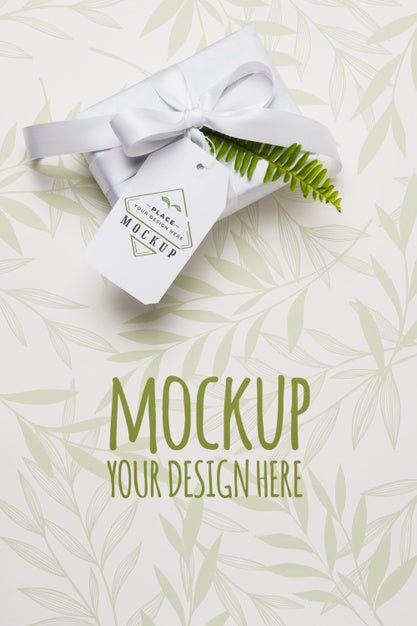 Top View White Gift With Mock-Up Tag Psd