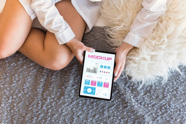 Top View Woman Holding Device With Mock-Up Psd