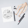 Top View Wooden Doll With Pens Psd