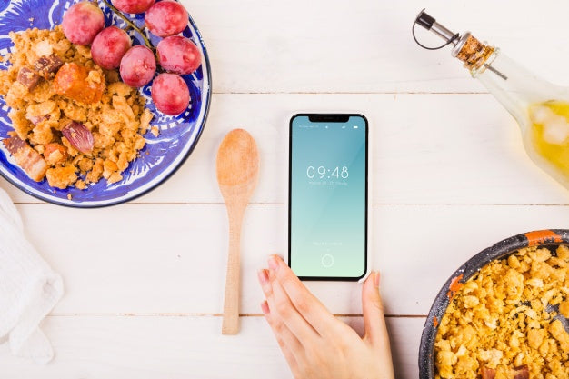 Traditional Spanish Food Mockup With Smartphone Psd