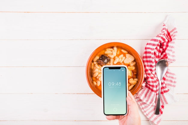 Traditional Spanish Food Mockup With Smartphone Psd