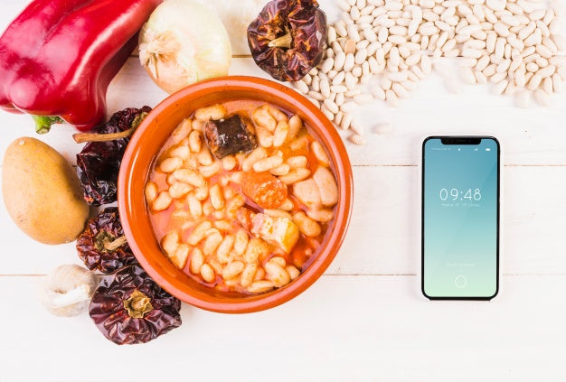 Traditional Spanish Food Mockup With Smartphone Psd