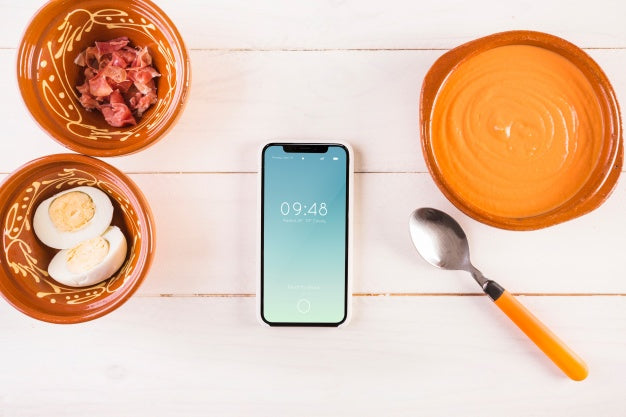 Traditional Spanish Food Mockup With Smartphone Psd